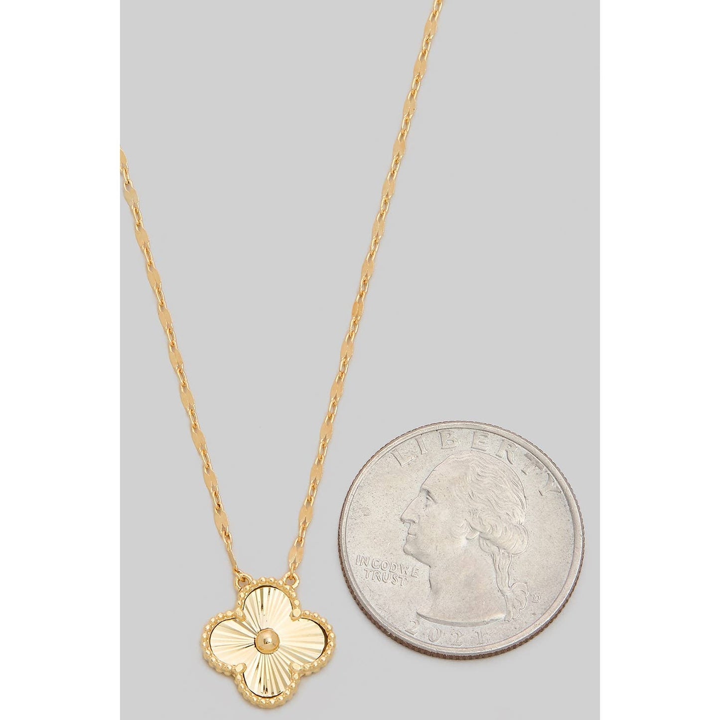 TEXTURED STARBURST CUTTED SHAMROCK PENDANT NECKLACE