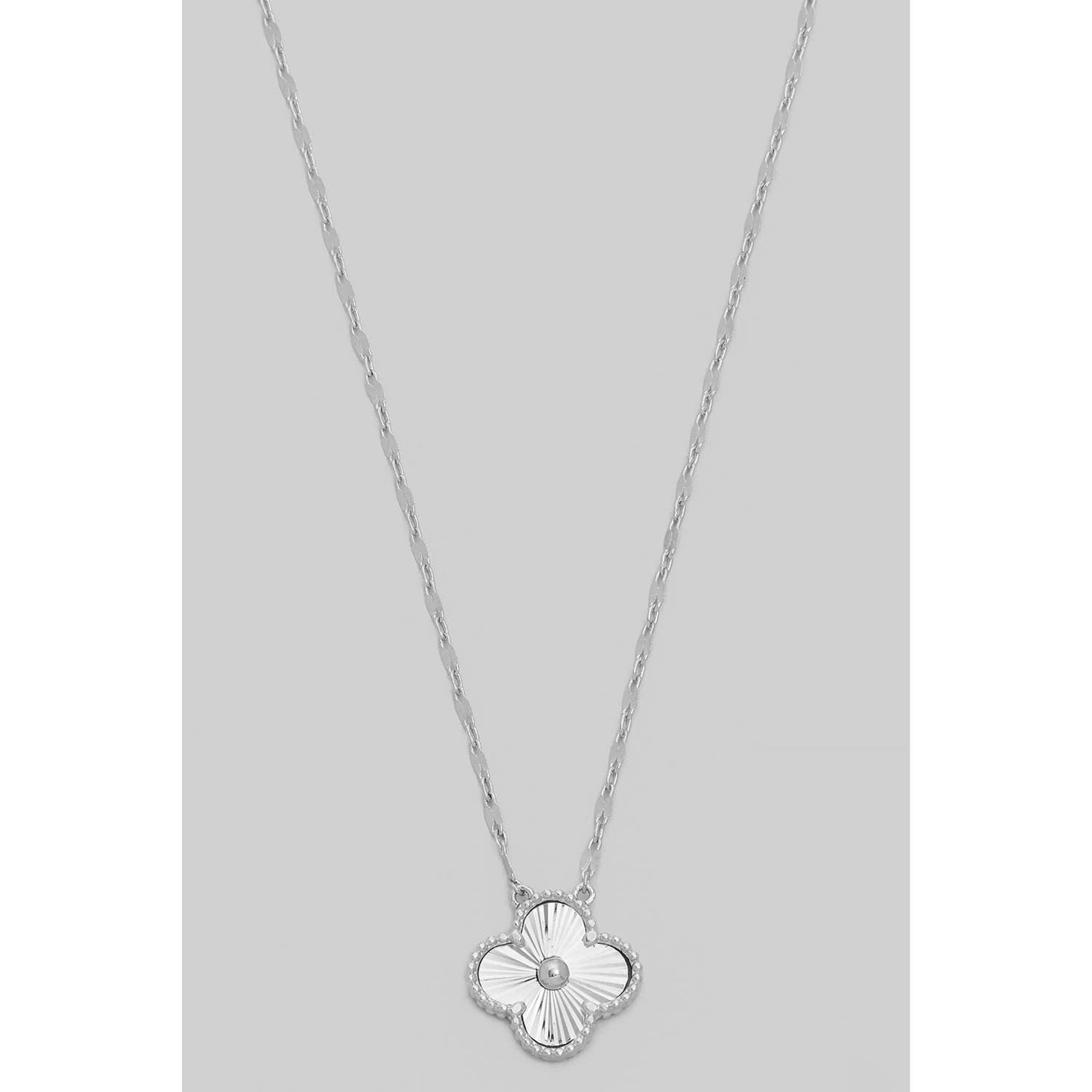 TEXTURED STARBURST CUTTED SHAMROCK PENDANT NECKLACE